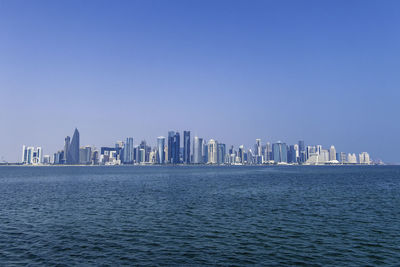 Doha, qatar, november 1, 2023. view of skyscrapers from the sea