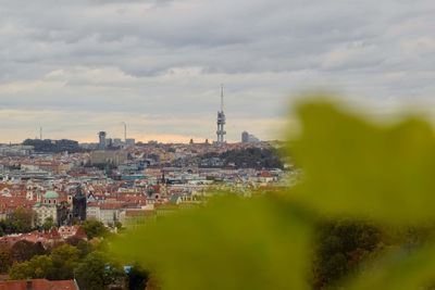 View of buildings against cloudy sky