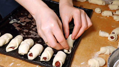 Midsection of man preparing food