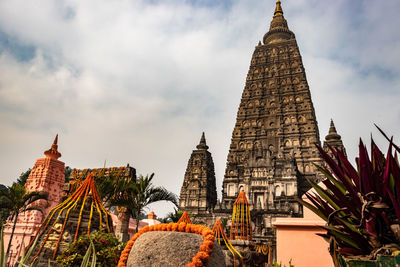 Mahabodhi temple buddhist stupas isolated with bright sky and unique prospective