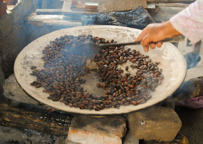 Close-up of person preparing food