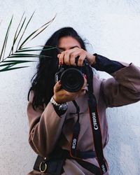 Portrait of man photographing