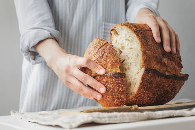 Midsection of man preparing food