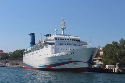 Ship in sea against clear sky