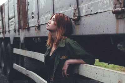 Side view of young woman