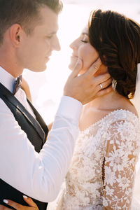 Young couple embracing outdoors