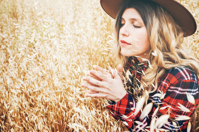 Young woman wearing hat