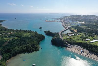 High angle view of swimming pool by sea against sky