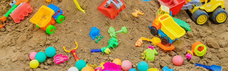 High angle view of toys on beach
