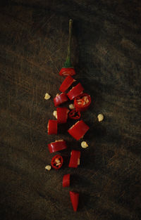 High angle view of red berries on table