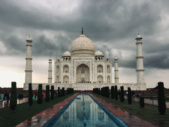 View of historical building against cloudy sky