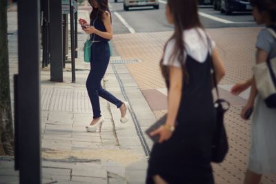 Woman walking on street