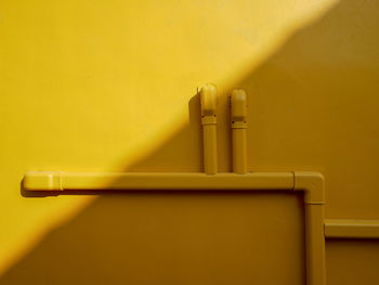 Close-up of yellow machine