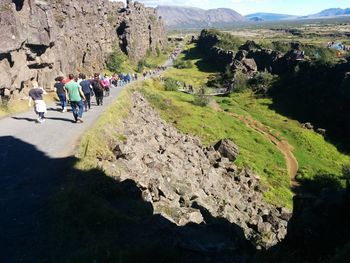 People walking on mountain road