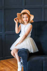 Portrait of smiling girl wearing hat