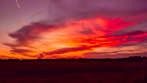Scenic view of dramatic sky during sunset