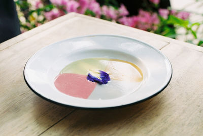 High angle view of ice cream in bowl on table