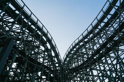 Low angle view of metallic structure against sky