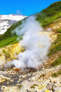 Dachniye hot springs, geyser valley in miniature near mutnovsky volcano in kamchatka peninsula