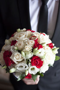 Close-up of roses holding bouquet