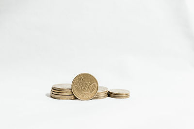 Close-up of coin against white background