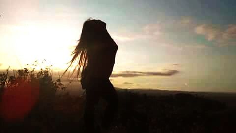 sunset, silhouette, sky, one person, nature, real people, leisure activity, standing, outdoors, women, beauty in nature, one woman only, day, adult, people