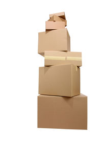 Cardboard boxes stacked against white background