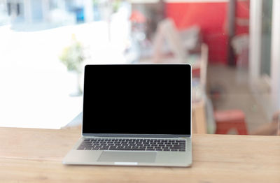 Close-up of laptop on table