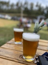 Close-up of beer glass on table