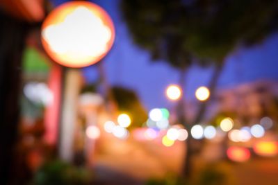 Defocused image of illuminated lights at night