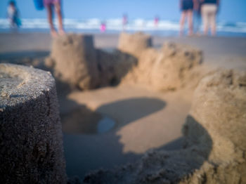 Shadow of people on beach