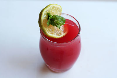 Close-up of juice with drink on table