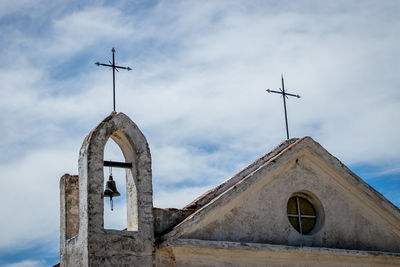 Low angle view of old church against sky