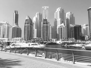 View of modern buildings against sky in city