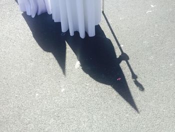 Low section of people standing on street