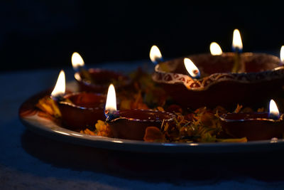 Close-up of burning candles