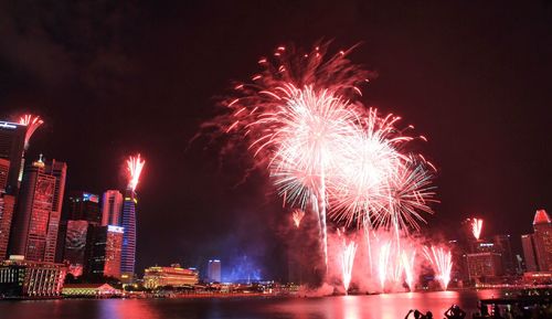 Firework display at night