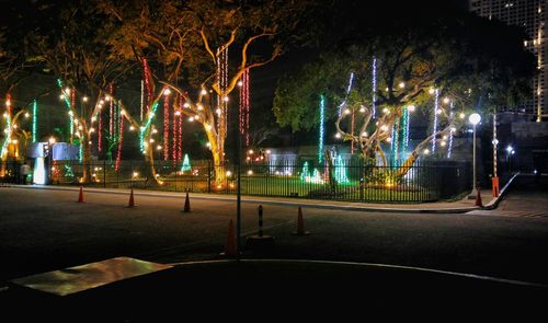 Illuminated street light at night