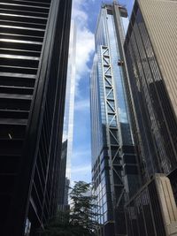 Low angle view of skyscrapers against sky