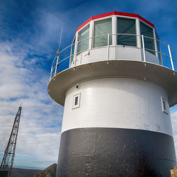 Low angle view of lighthouse against sky