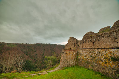 View of castle against cloudy sky