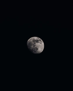 Low angle view of moon against sky at night