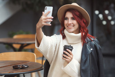 Young woman using mobile phone