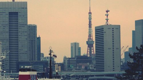 Modern buildings in city against sky