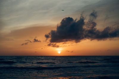 Scenic view of sea against sky during sunset