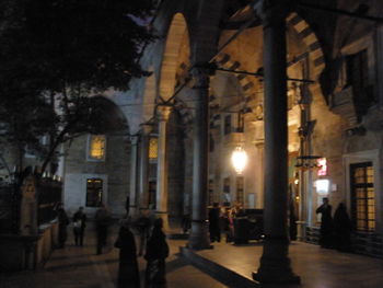 Buildings in city at night