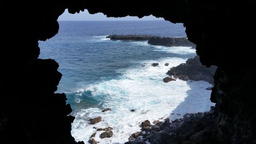 Scenic view of sea seen from cave at easter island