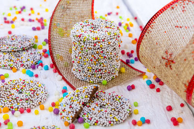 High angle view of multi colored candies on table