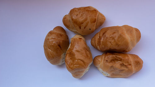 Close-up of cake against white background