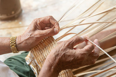 Close-up of man holding hands